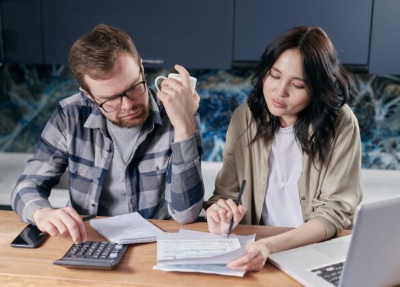 Image source: https://www.pexels.com/photo/couple-looking-at-their-bills-6964105/