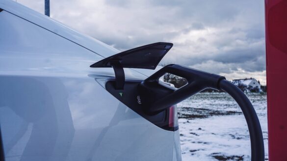 Charging an EV. Image source: https://www.pexels.com/photo/close-up-of-a-the-process-of-charging-an-electric-car-10800215/